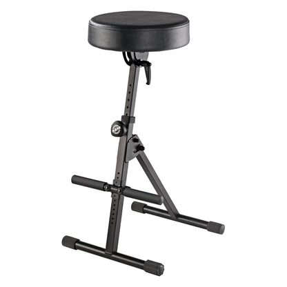 14061 pneumatic musician stool three-quarter front view with round black padded seat, height adjustment knob, release lever and tubular footrest bars, K&M