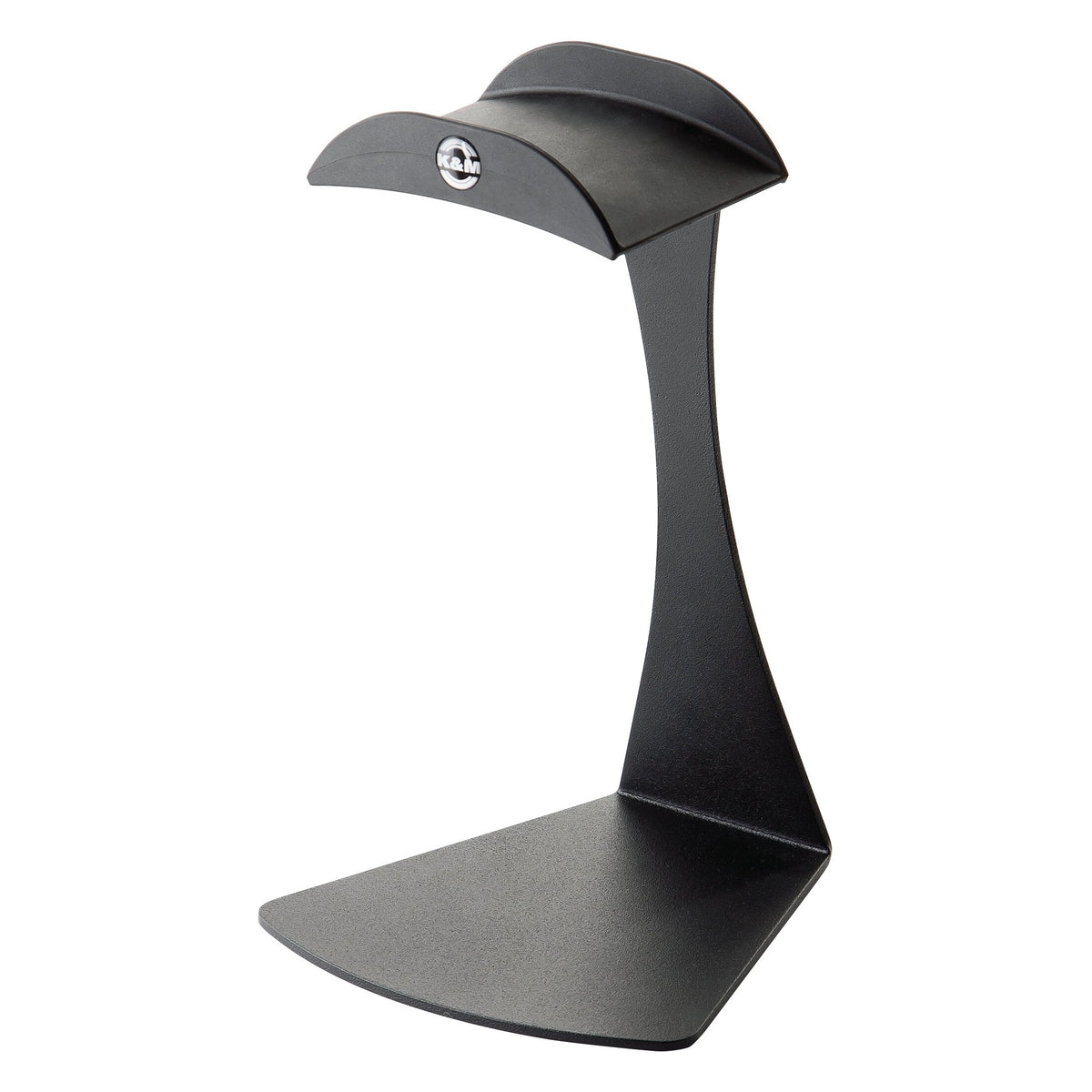 16075 headphone table stand front three-quarter view showing curved headband cradle with K&M logo badge and wide triangular base, K&M