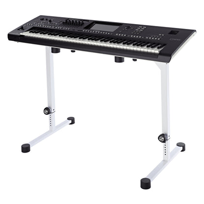 18810 Omega table stand in use supporting a Yamaha Genos keyboard on its rubber-capped top arms, K&M