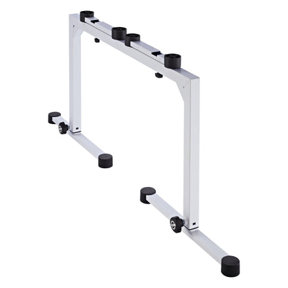 18810 Omega table stand angled rear view showing sliding top support arms with black rubber pads and folding base legs, K&M