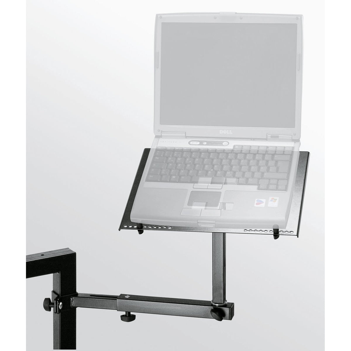 18815 laptop holder in use with a laptop resting on the tray and retaining pegs, arm clamped to a keyboard table frame, K&M