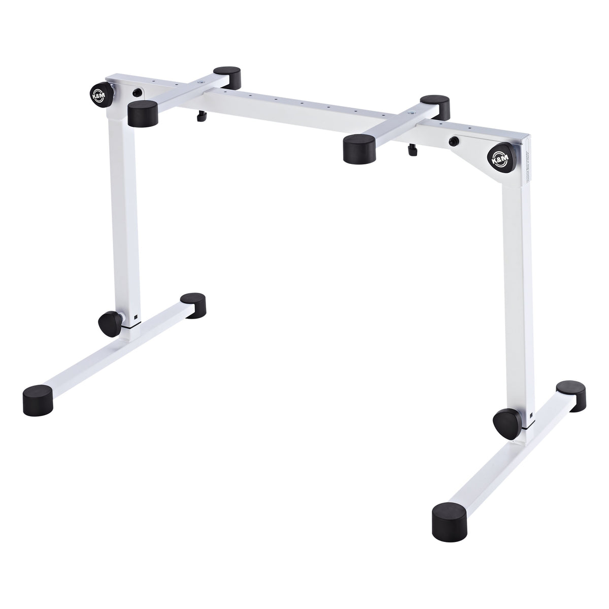 18820 Omega Pro keyboard stand in pure white, three-quarter view at lowest height setting with legs collapsed to the bottom of the telescoping columns, K&M