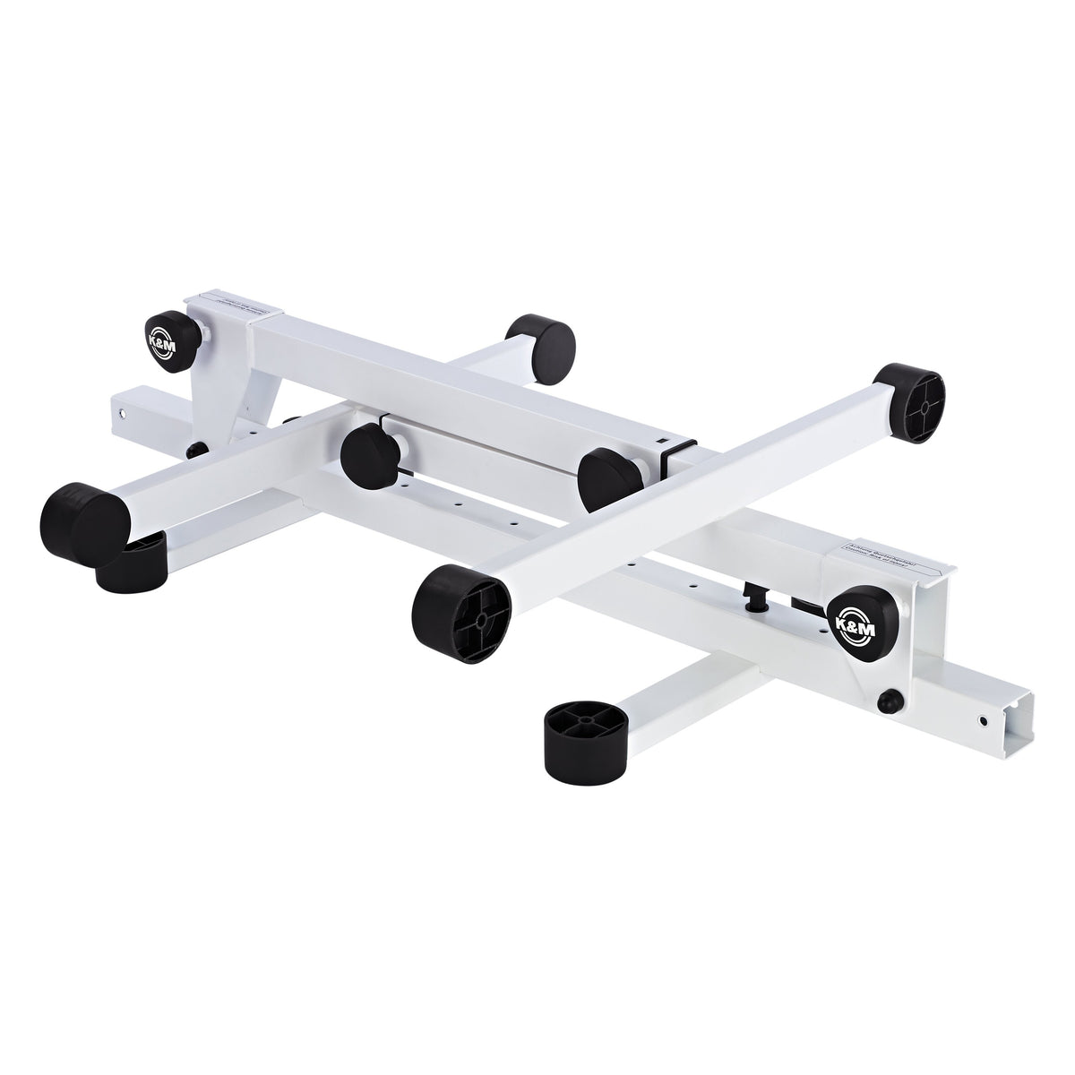 18820 Omega Pro keyboard stand in pure white, folded flat showing the collapsed frame, crossing tubes and K&M logo clamp knobs, K&M