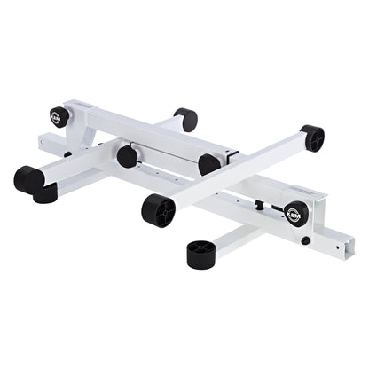 18820 Omega Pro keyboard stand in pure white, folded flat showing the collapsed frame, crossing tubes and K&M logo clamp knobs, K&M