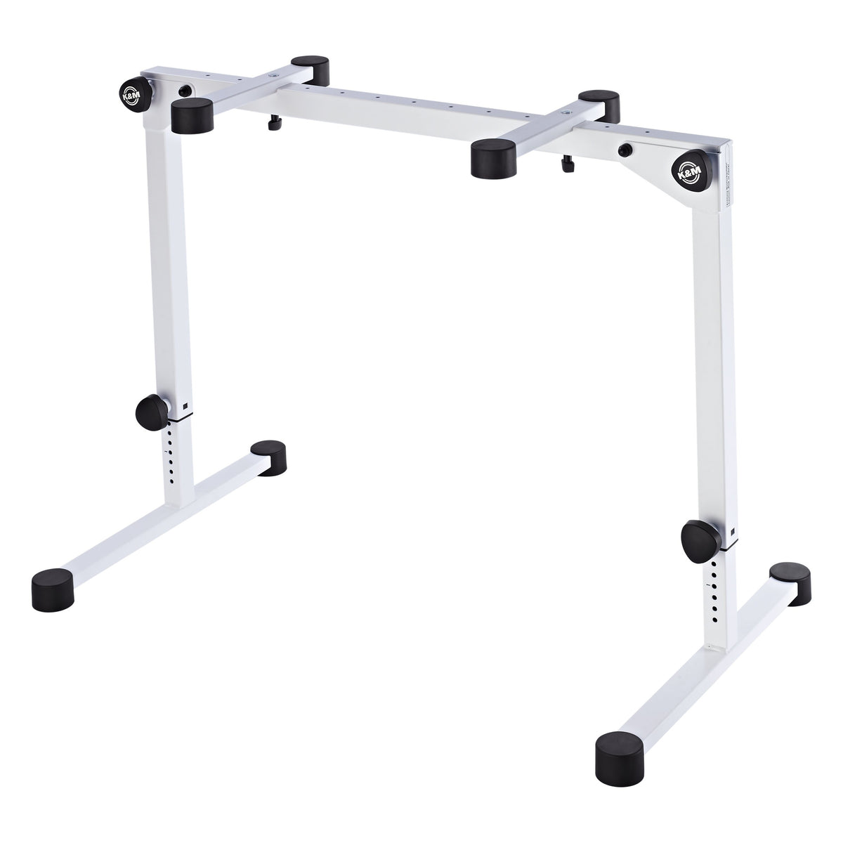 18820 Omega Pro table-style keyboard stand in pure white, front three-quarter view showing the top support arms with rubber pads and K&M logo knobs, K&M