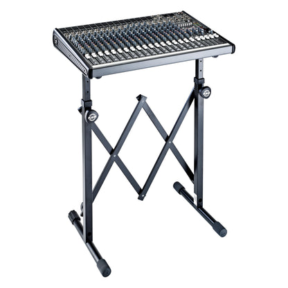 18826 equipment stand supporting a large analog mixing console on the padded arms, K&M