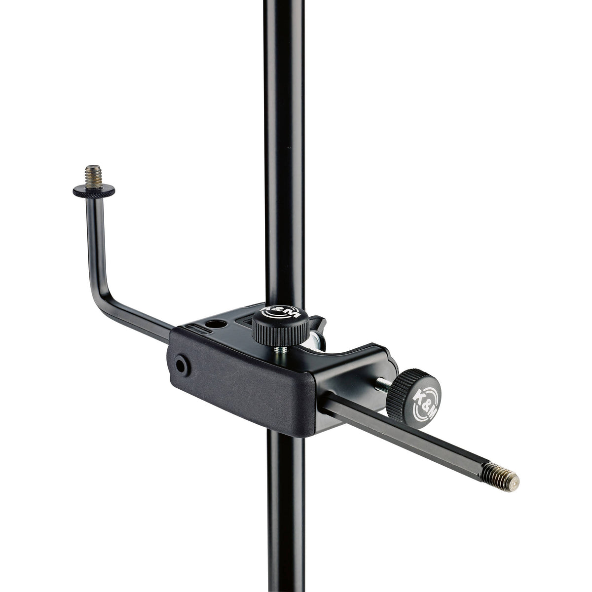 24050 universal microphone holder clamp mounted on a stand pole, front view of the rubberised clamp body with K&M knobs and upturned threaded arm, K&M