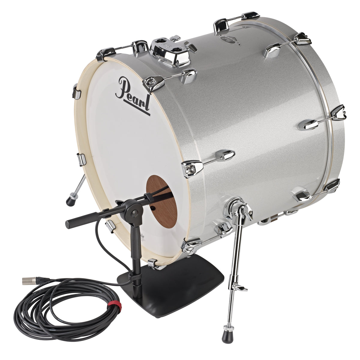 25993 low-profile mic stand beside a Pearl bass drum with boom angled into the front head port hole, flat base on floor and XLR cable coiled, K&M