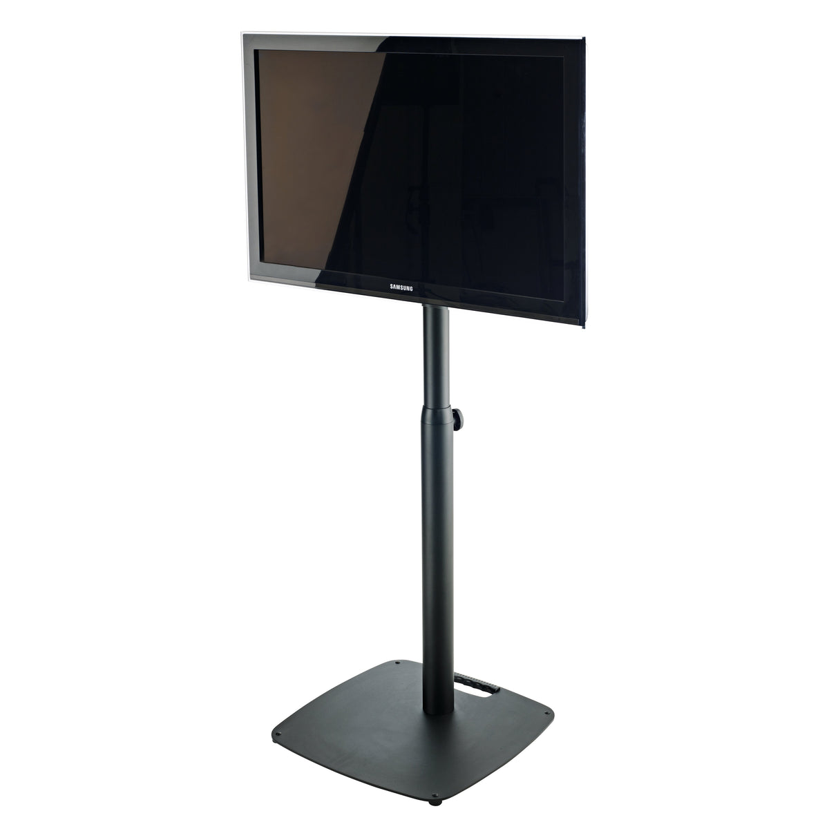 26782 VESA monitor stand in use with flat screen mounted on the black column, showing height-adjustment knob and square base with carry handle, K&M