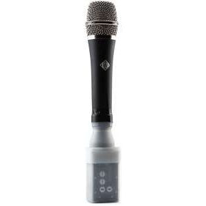 Plug-on transmitter silicone cover in use, clear sleeve on transmitter attached to a handheld microphone with tape at the neck joint, Lectrosonics