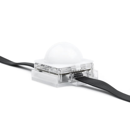 VC-Dot 9 diffuser dome installed on clear clip-mounted pixel module, side angle showing frosted polycarbonate cap, Martin Lighting