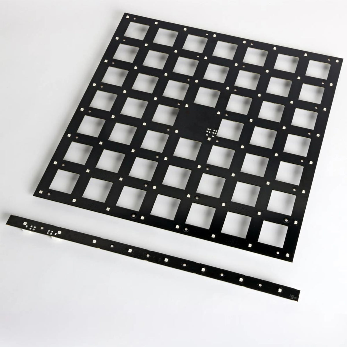 VC-Strip 60 pixel strip shown beside a large 7x7 VC-Grid style LED panel for scale, Martin Lighting