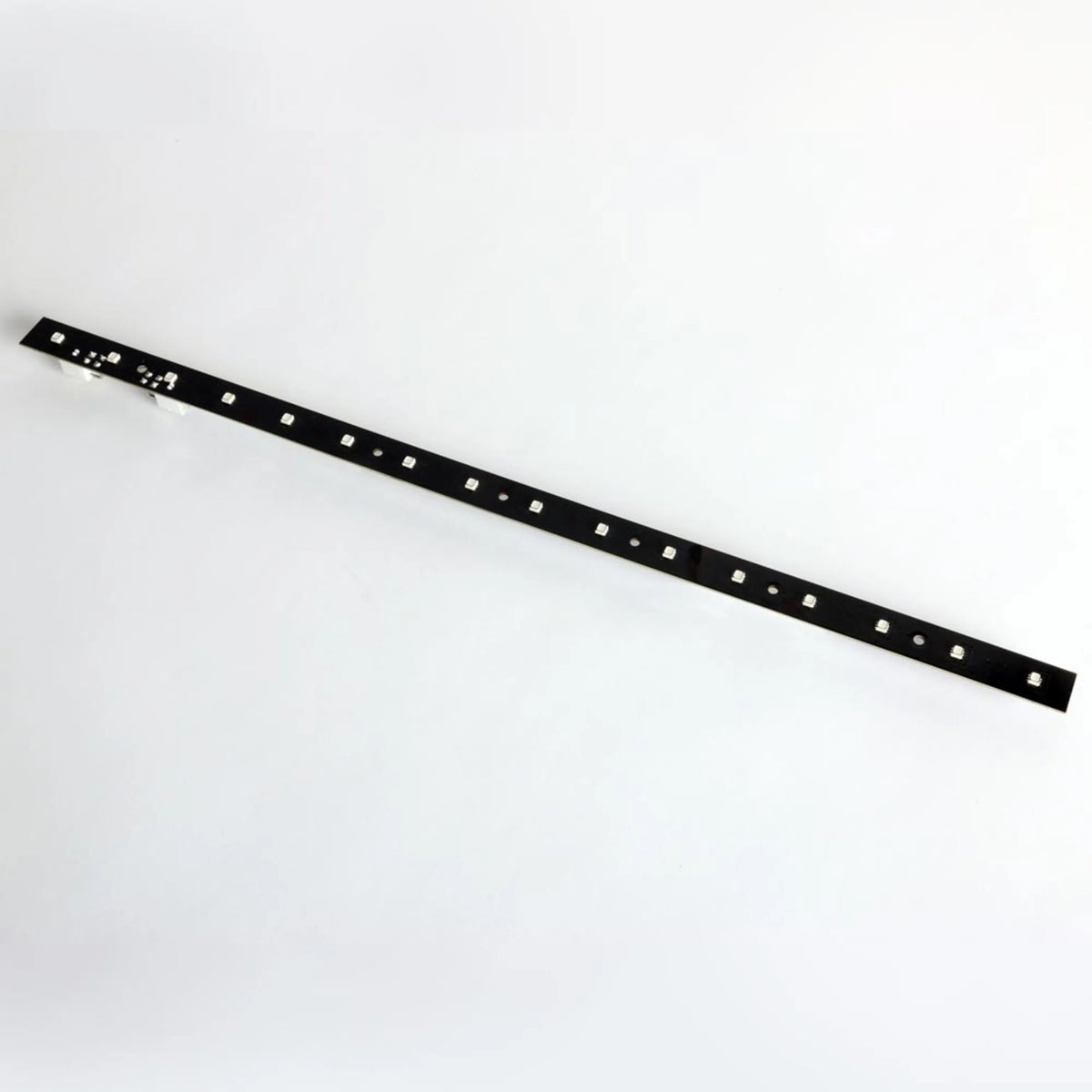 VC-Strip 30 RGB LED narrow pixel strip front view showing evenly spaced surface-mount RGB LEDs on slim black PCB, Martin Lighting