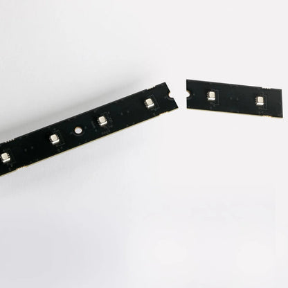 VC-Strip 30 close-up of cut-to-length break point with mounting hole and RGB pixel LEDs, Martin Lighting
