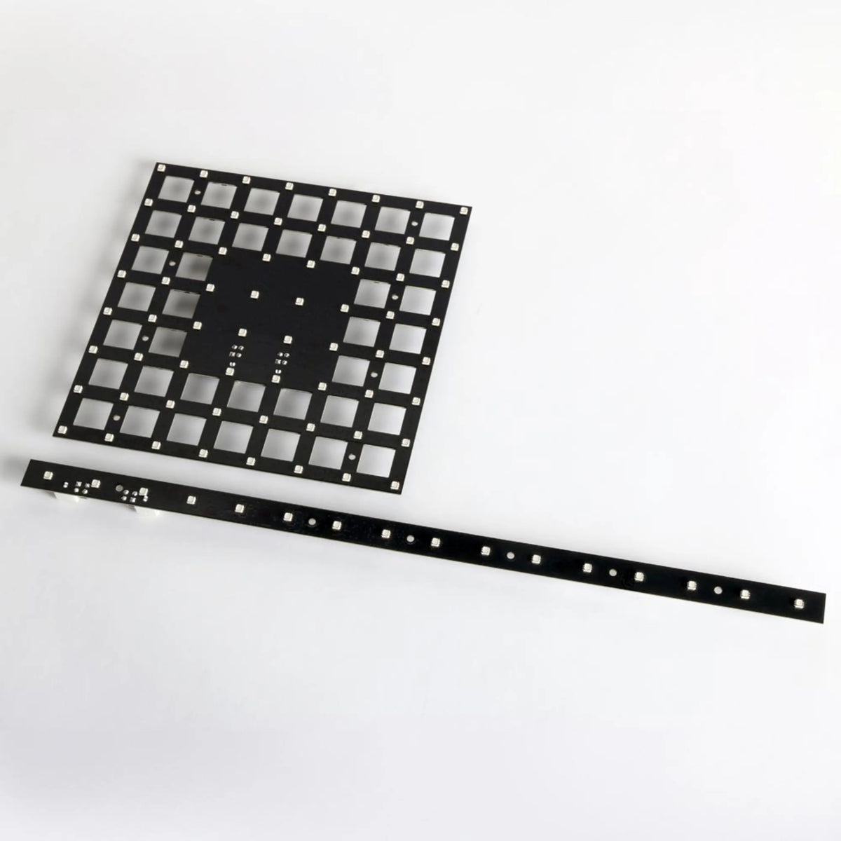 VC-Strip 30 pixel strip shown beside a square VC-Dot style LED panel for scale comparison, Martin Lighting