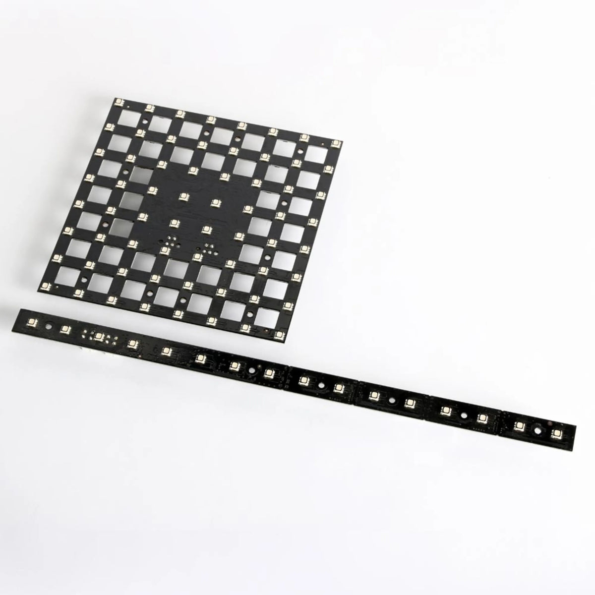 VC-Strip 25 LED strip shown next to a square VC-Dot style RGB pixel tile for scale, Martin Lighting